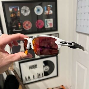 Oakley Black and White Sunglasses with Orange Lenses